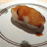 Plate with single piece of SUGARFISH abalone nigiri
